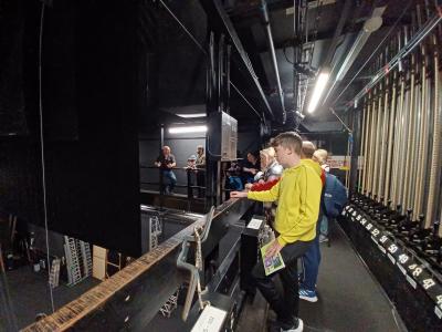 Friends members enjoying a backstage tour at the Alhambra Theatre